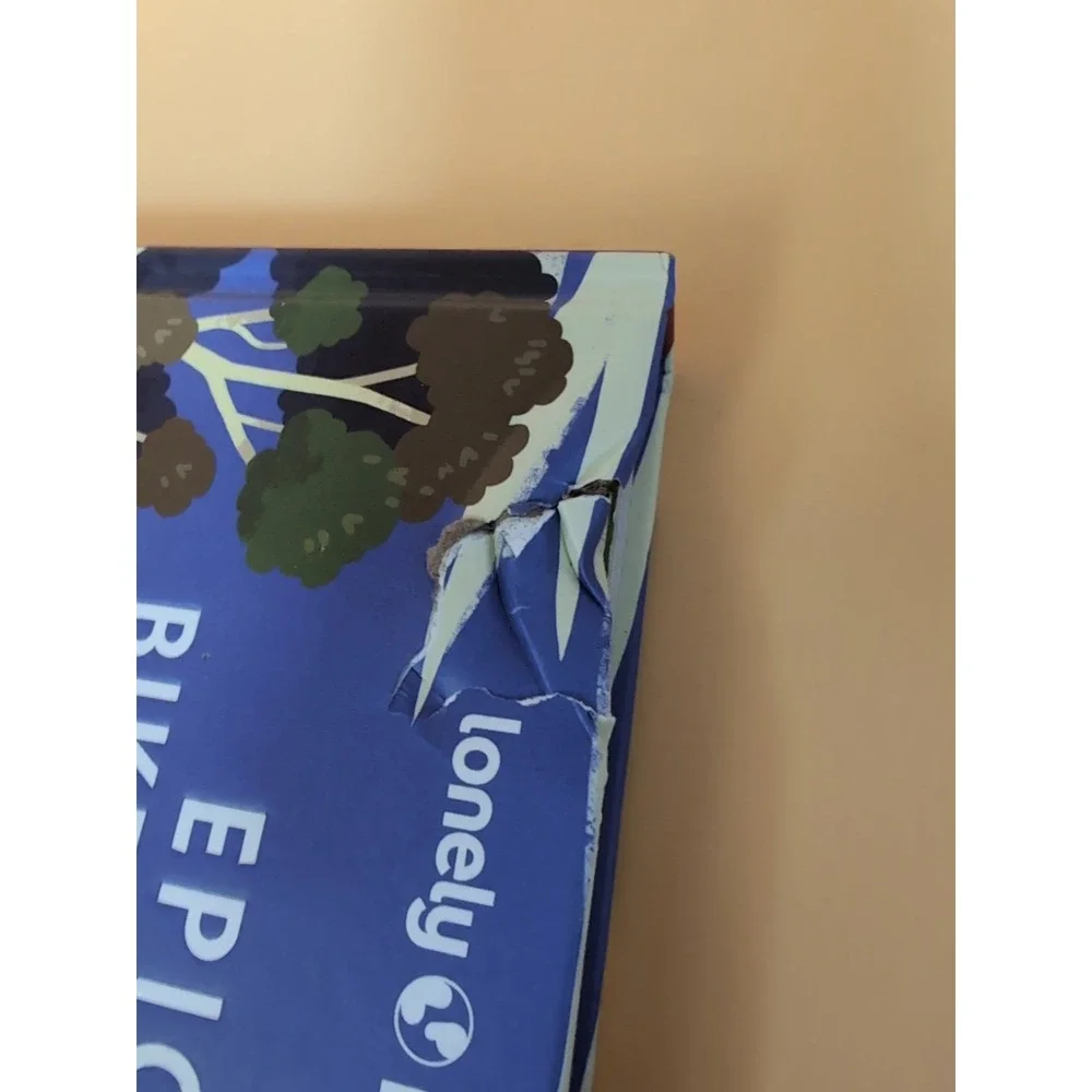 New Book Damaged Cover lonely Planet Epic Bike Rides of Australia and New Zealan